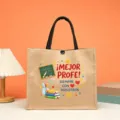 Jute tote bag detail showcasing colorful Spanish teacher print and sturdy black handles. - Best Teacher Style