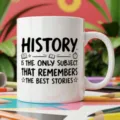 Detailed view of a white ceramic coffee mug featuring an inspiring history teacher quote design. - 350ml / History Education Style