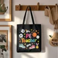 Schwarze Canvas-Tragetasche mit PE-Lehrer-Grafik und Sportelementen für den täglichen Schulgebrauch. - Stil 16 / Schwarz