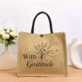 Vintage Jute Tragetasche mit schwarzen Henkeln, große Leinentasche mit Blumenmuster Alltag. - Botanischer Druck Stil Siebzehn