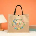Detailed view of large jute tote bag featuring colorful floral teacher appreciation print. - Style 12