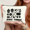 White canvas makeup pouch featuring cute baking graphics and black zipper for daily use. - Baking Theme Illustration Style (14)