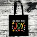 Black canvas tote bag with cute English print, durable daily shoulder bag for casual use. - Style 07