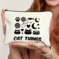 White canvas zipper pouch featuring cute black cat line art illustration and text. - Cat Illustration Style (2)