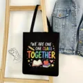 Black canvas tote bag featuring colorful school theme prints, ideal for daily use and school! - School Style 04