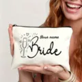 Close-up detail shot of the custom bridal canvas makeup pouch with lovely line art. - Champagne Goblet Bride Style (Art No 7.16)