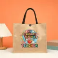 Jute tote bag featuring a cute teacher themed graphic print, perfect daily canvas handbag. - Style 9