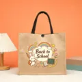 Detailed close-up of the school themed jute tote bag featuring cute cartoon bunny rainbow print. - Back to School Rabbit Style (10)