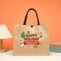 Detailed view of the Christmas themed jute tote bag featuring festive cartoon prints and handles. - Happy Holiday Christmas Style (6)