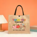 Teacher appreciation burlap tote bag with cute cartoon fruit print and rainbow lettering aesthetic. - Thank You Teacher Style (10)