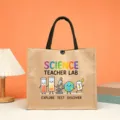 Science teacher jute tote bag detail showing cute cartoon science elements and bright text. - Science Teacher Lab Style (4)