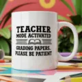 Tasse a cafe en ceramique blanche avec motif dragueur de professeur et livre pour ecole. - Style Mode Enseignant Activé (2) / 350ml Paquet Unique