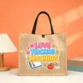 Detailed view of the vintage jute tote bag with cute teaching print and sturdy handles. - Love Teaching Style (7)