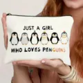 Canvas cosmetic bag with cute penguin print and zipper, ideal for travel and daily storage use. - Penguin Style (011)