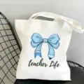 Borsa tote in tela bianca stampata alla moda con fiocco blu per uso quotidiano. - Nastro Blu Matita Stile 10 / 35x40cm