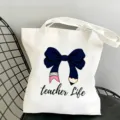 Borsa tote in tela stampata alla moda per uso quotidiano con un grazioso design a fiocco. - Bianco Nero Stile Semplice 5 / 35x40cm