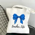 Canvas tote bag with blue bow teacher print, durable shopping bag and daily casual handbag. - Blue Pen Style 2 / 35x40cm