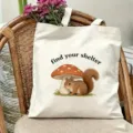 Detailed view of white canvas tote bag featuring cute squirrel and mushroom print, ideal use. - Squirrel Style (5)