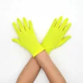 Neon yellow stretch gloves detail shot, showing breathable fabric and elastic wrist design. - Bright yellow