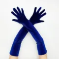 Close-up view of elegant royal blue velvet long gloves, highlighting soft texture and fine stitching. - One Size / Blue