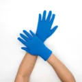 Women's blue stretch gloves, smooth fabric detail for sun protection or performance. - Kingfisher Blue