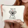 White canvas makeup pouch featuring cute koala nurse graphic for daily use and travel gifts - Koala Nurse