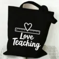 Schwarze Stofftasche für Lehrer mit Aufdruck, großer Kapazität und Alltagshandtasche. - Herz und Lineal Muster (13) / 35x40cm / Schwarz