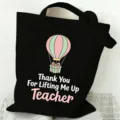 Black canvas tote bag with teacher appreciation hot air balloon print, large capacity. - Hot Air Balloon Pattern (4) / 35x40cm / Black