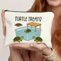 Canvas makeup pouch detail, featuring cute turtle cartoon graphic, ideal for travel storage use. - Turtle Treats Style (5)