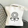 Weisse Leinwand Tragetasche mit Blumen Muster, grosse Kapazitaet Freizeit Handtasche. - 35x40cm / Gänseblümchen und Brillen Muster