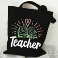 Black canvas tote bag with teacher book graphic, large capacity casual shoulder shopping bag for women. - Books and Heart Pattern (1) / 35x40cm / Black