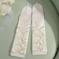 Elegant white satin long gloves with delicate lace floral appliqués and bows for wedding. - One Size / Off White