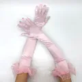 Pink satin long gloves detail featuring delicate tulle ruffles and pearl accents for party wear. - Pink