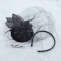 Black vintage fascinator hat with mesh veil, feather and flower headband hair clip. - Black