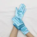 Close-up detail of light blue satin gloves, soft stretchy fabric for evening party wear. - Sky Blue