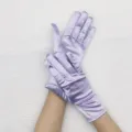 Close-up detail of short lavender satin stretch gloves, smooth texture for elegant evening wear. - Light Purple