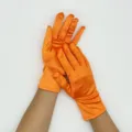 Vibrant orange short stretch satin gloves, ideal for evening parties and formal dress events. - Orange