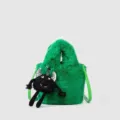 Green plush bucket bag with cute black little monster doll charm for women daily fashion. - Bag With Pendant / Green