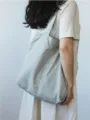 Borsa a tracolla minimalista in nylon, borsa da viaggio impermeabile e leggera per donna. - Grigio
