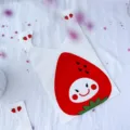 Detailed view of the cute strawberry pattern plastic packaging bag for bakery snacks and cookies. - Width 13.5CM * Length 22CM (50 Pieces/Pack)