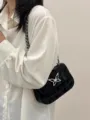 Borsa a tracolla nera alla moda con elegante chiusura a farfalla e raffinato design. - Nero