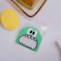 Bolsa de plástico transparente de monstruo lindo autoadhesiva para galletas caramelos regalo - 100 Unidades/Paquete (7*7+3cm)