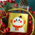 Christmas clear self-adhesive cookie candy bags featuring cute gold snowman design detail - 100 Pieces/Pack (7x7+3cm) / Christmas Snowman Style