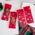 Sachets d'emballage de bonbons de Noël rouges scellés pour nougat et biscuits de fête - Sachets pour nougat / 9.5x4cm (100 Pièces/Pack)