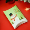 Scatola cuscino Natale scatola regalo caramelle carta con simpatico design di pupazzo di neve. - 14*10*2.8cm / Pupazzo di Neve Verde