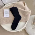 Womens warm plush winter mid-tube socks in classic black, soft fuzzy knit house sleep socks. - One Size / Black