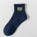 Dark blue short casual socks for men and women featuring choose happy embroidery style. - One Size / Navy Blue