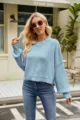 Close-up detail of women's casual light blue crewneck knit sweater with long sleeves. - Light Blue