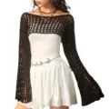 Close-up detail of the black crochet shrug with flare sleeves and chic inner wear style. - S / Tops / Black