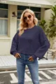 Detail view of the dark purple oversized crewneck knit sweater, cozy long batwing sleeves. - Navy Blue